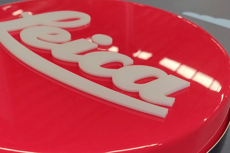 無邊發(fā)光字與吸塑發(fā)光字有什么區(qū)別？